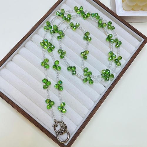 Gota de cristal que cruza la cadena del teléfono (verde)