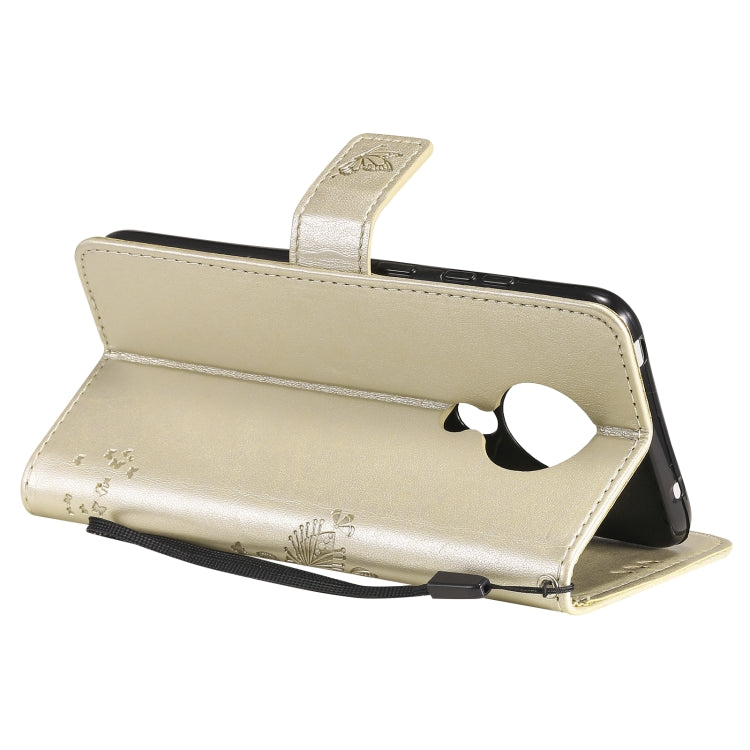 Para Nokia 5.3 Árbol y gato Patrón de impresión prensada Funda de cuero PU de la PU con soporte y ranuras para tarjetas y cordones y cordones (oro)