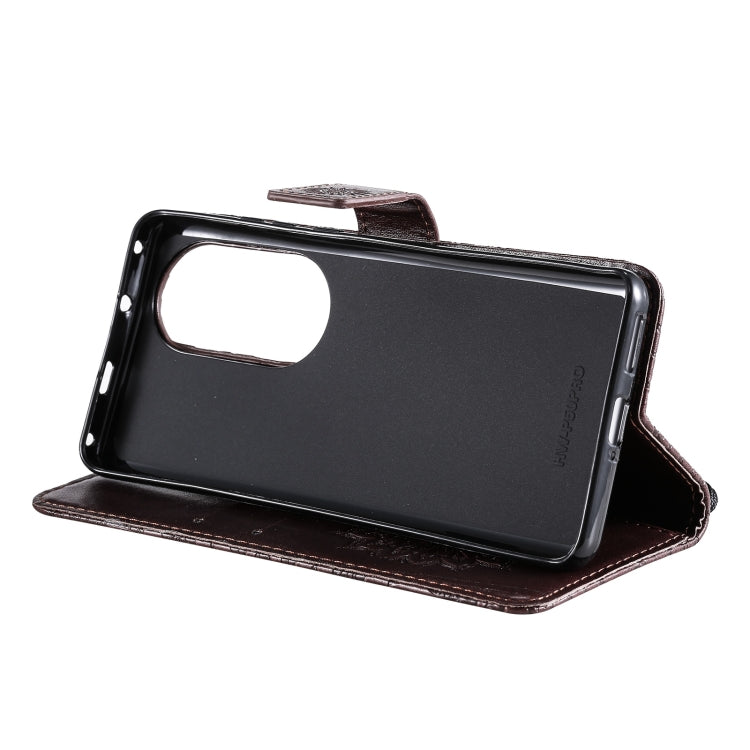 Para Huawei P50 Pro Sun Sun Pattern Horizontal Flip Funda de cuero con ranura para tarjeta y soporte y cartera y cordón (marrón)