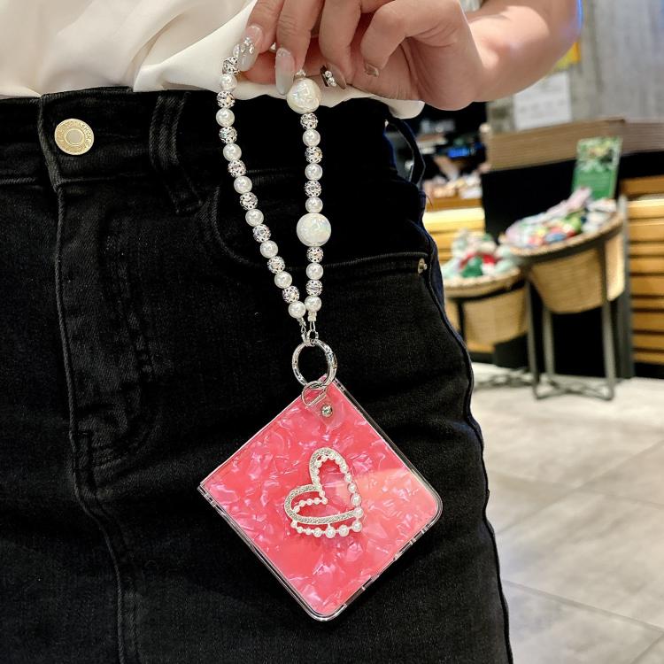 Funda para Samsung Galaxy Z Flip7 5G con textura perlada y patrón de corazón, con pulsera (rosa)
