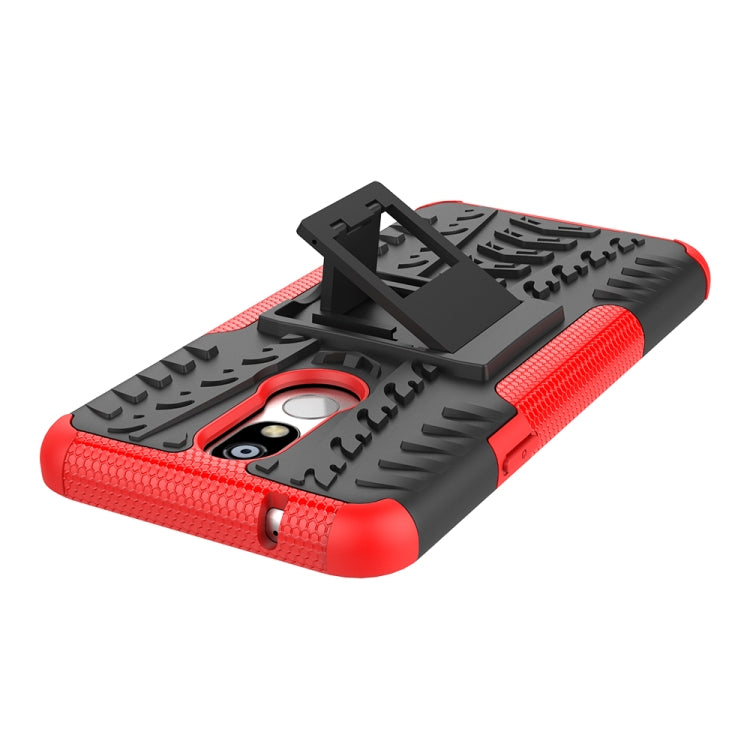 Estuche LG K40 con Patrón de Neumáticos PC + TPU a Prueba de Golpes con Soporte (Rojo)