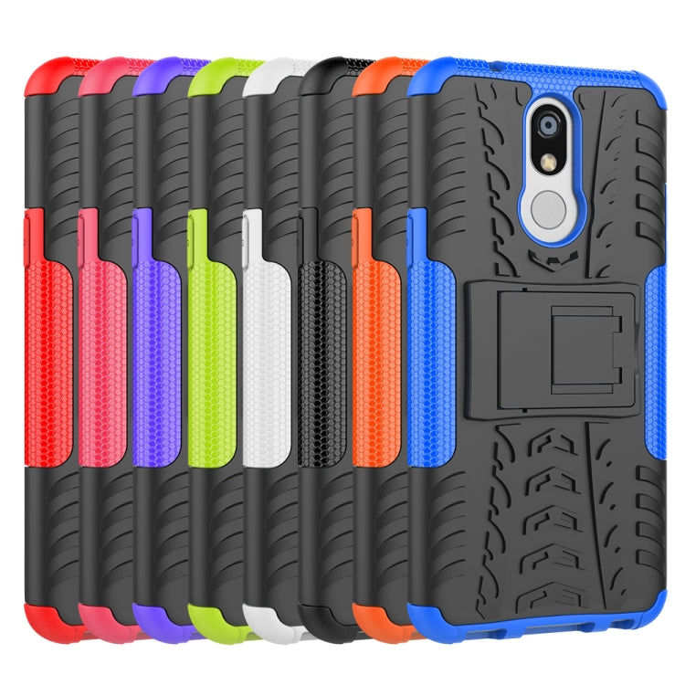 Estuche LG K40 con Patrón de Neumáticos PC + TPU a Prueba de Golpes con Soporte (Rojo)
