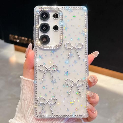Funda antigolpes con lazo de cuatro esquinas y purpurina de diamante para Samsung Galaxy S25 5G (Estrellas transparentes)